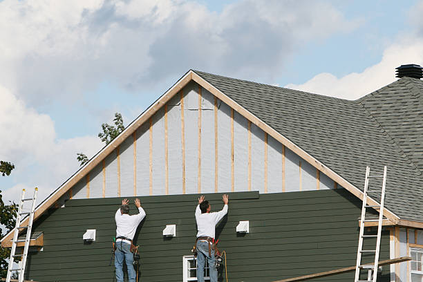 Professional Emergency Siding Repair technician working in Tallmadge, OH